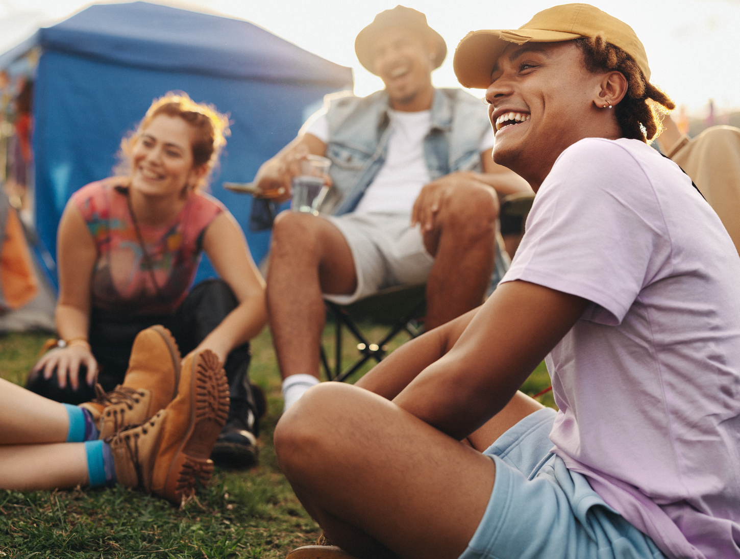 Friends enjoying a festival in the hot British summer